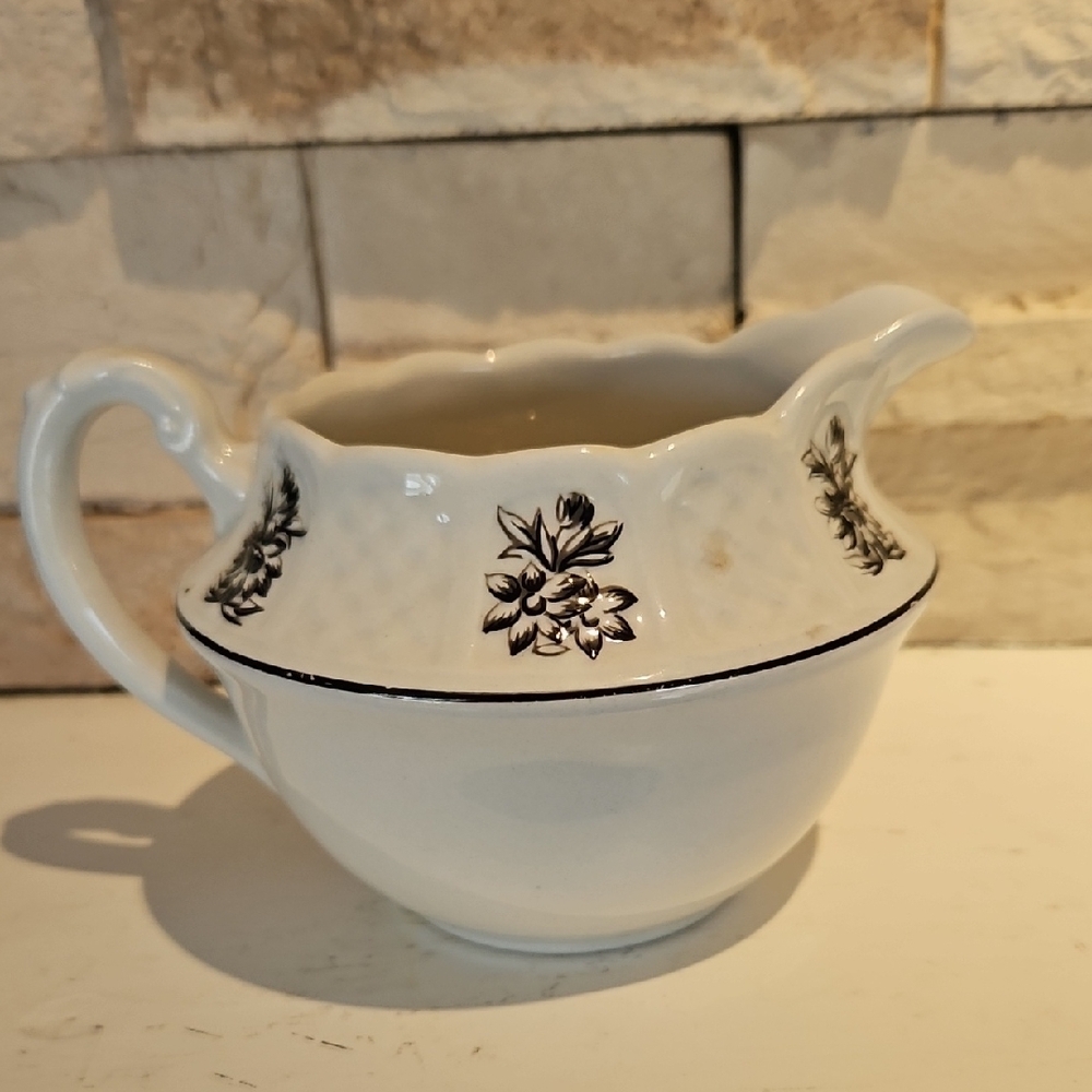 Floral Creamer with Black Accents